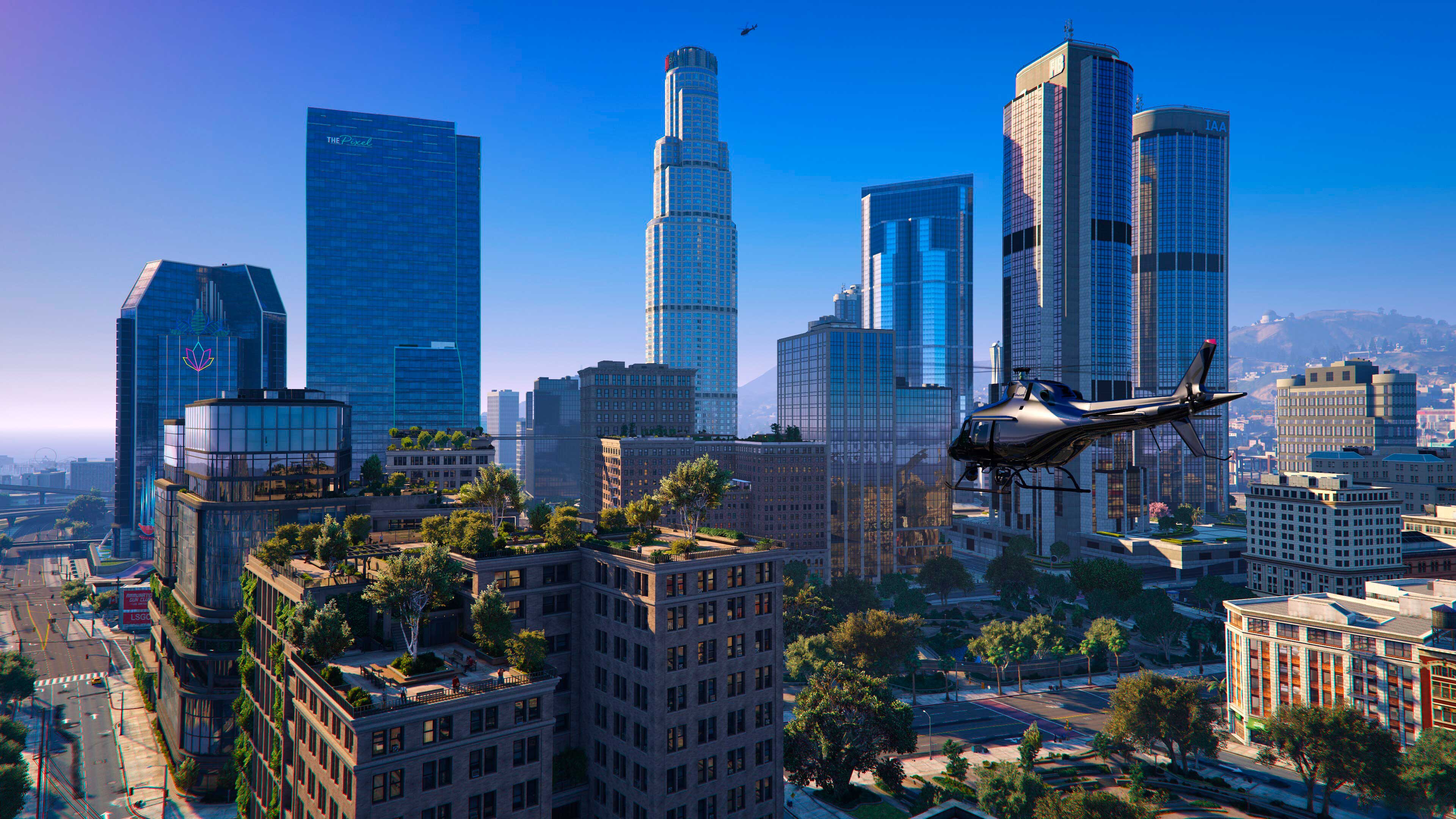 A helicopter flies above the blue skies of Los Santos.