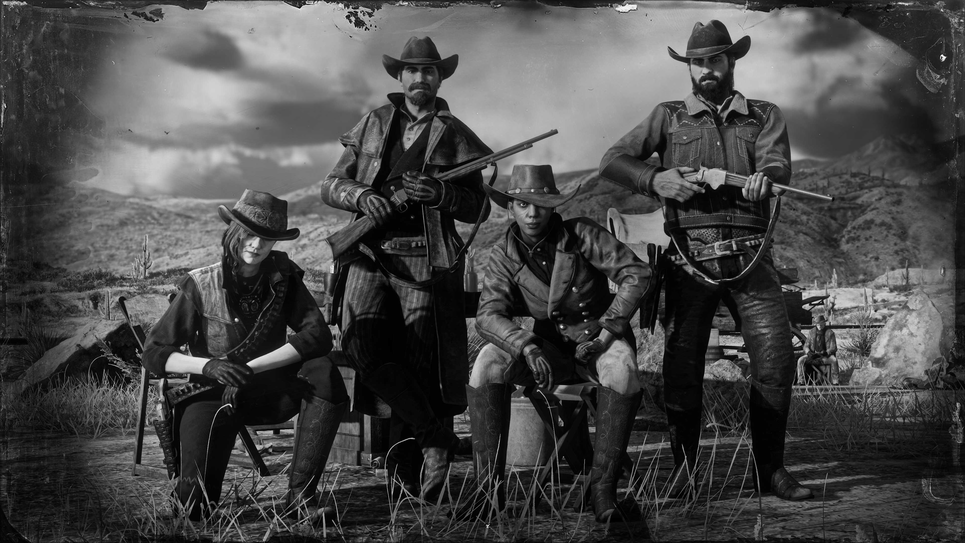 Red Dead 在线模式四人玩家团队摆出姿势进行合影。