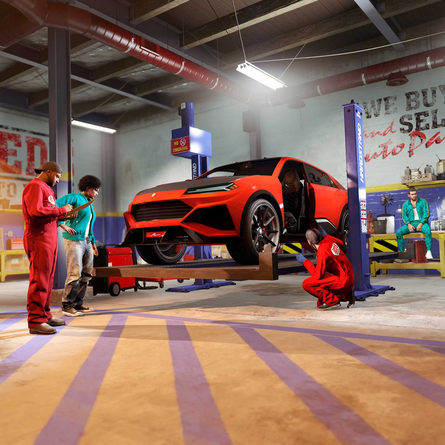 Mechanics at Red’s Garage working on a Pegassi Toros.