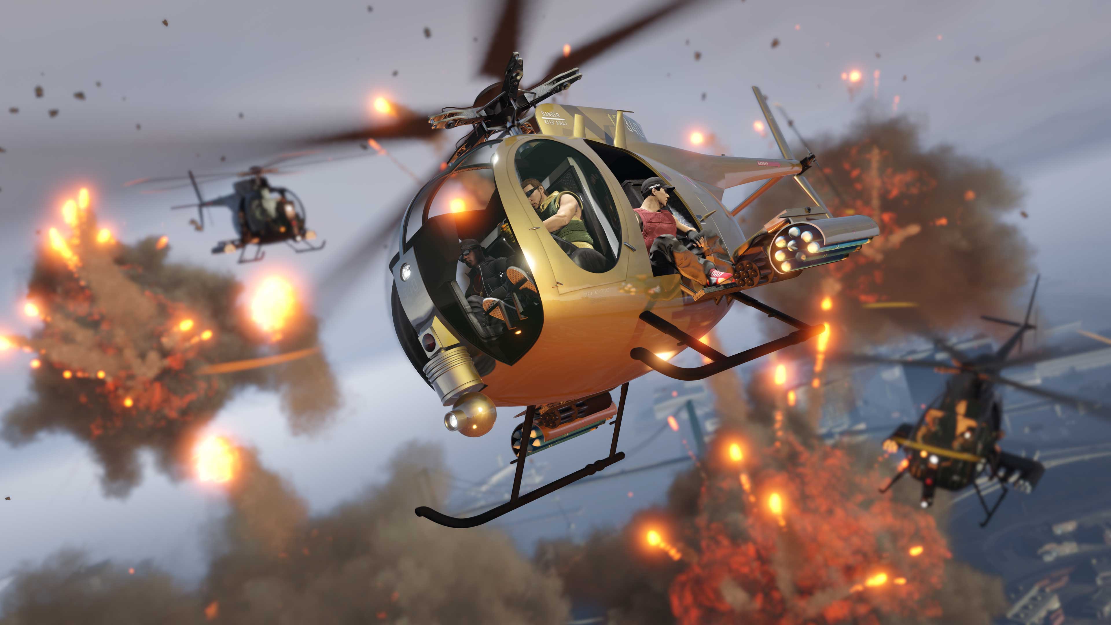 A Gold Buzzard Attack Chopper flies amongst other helicopters and mid-air explosions.