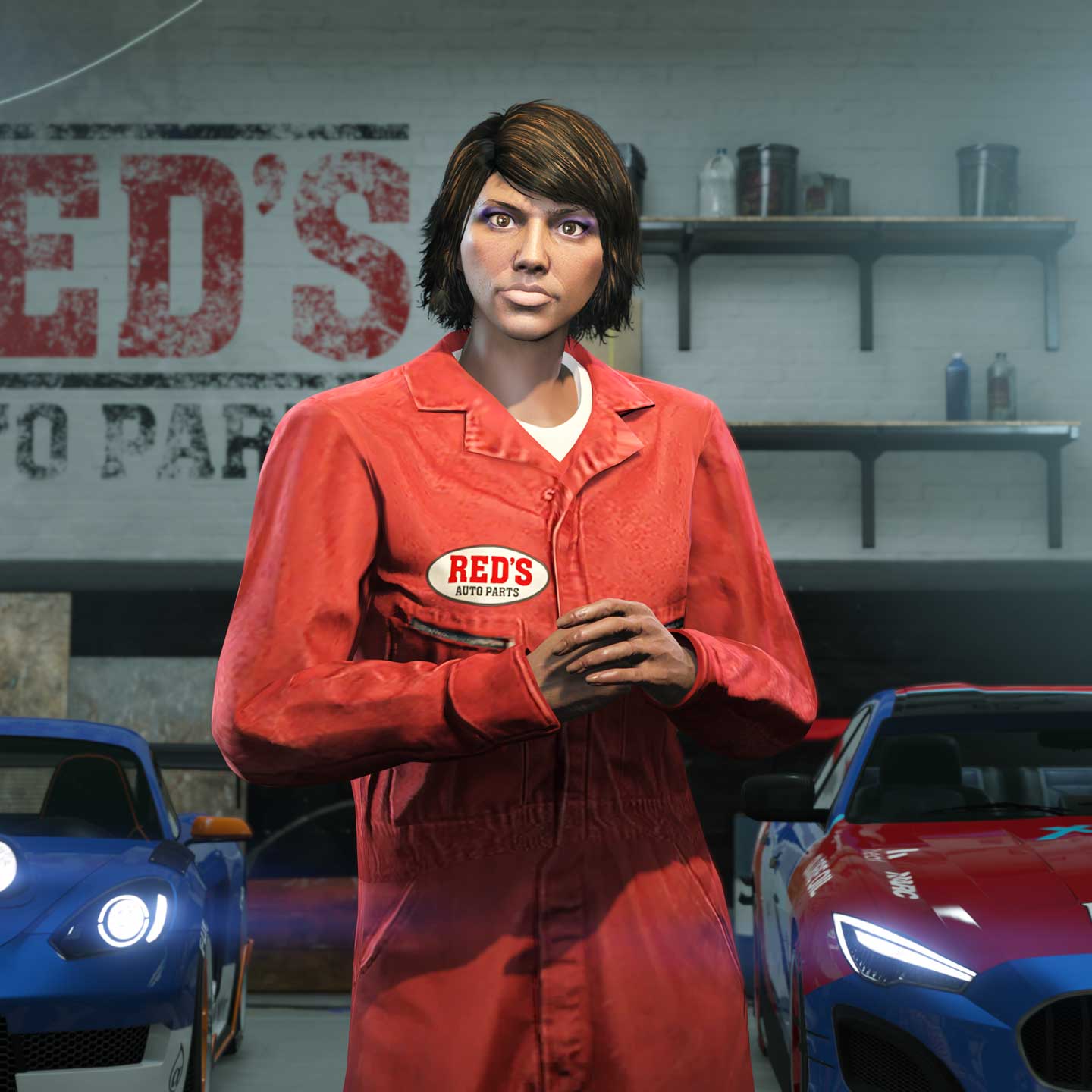 A GTA Online character wears the red “Red’s Overalls” while inside of a garage.
